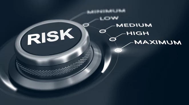 Risk button pointing towards maximum risk